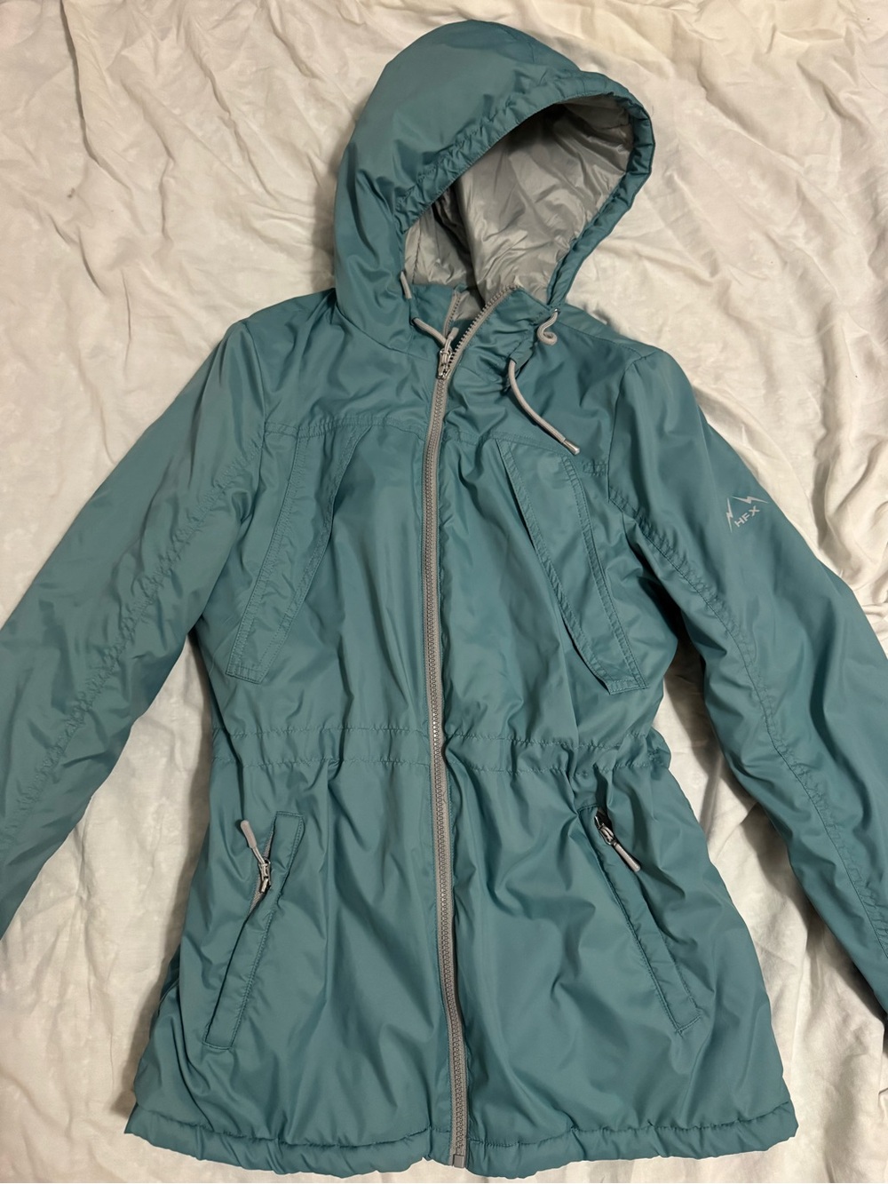 Women's Hooded performance Jacket in Teal with Adjustable Waist
